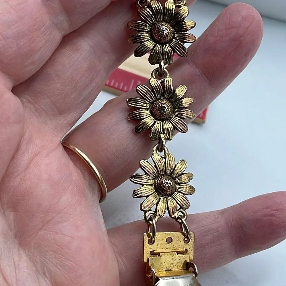 Vintage sunflower cape sweater clip.